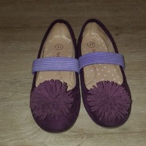 Purple pom flat